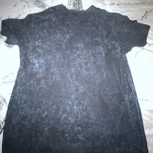 Here I have a black and blue graphic shirt from boohooMAN.